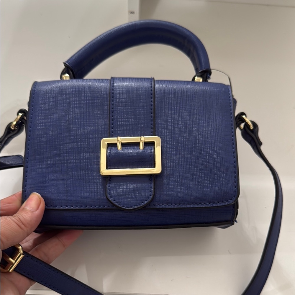 Elegant Blue Handbag with Gold Accents